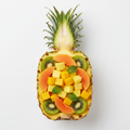 Fruit Tropical Mix served in a hollowed pineapple bowl
